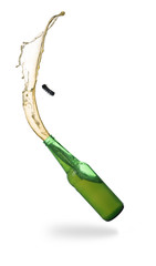 Wall Mural - Green beer bottle opening with exploding and splashing isolated on white background