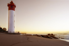 Lighthouse At Sunrise
