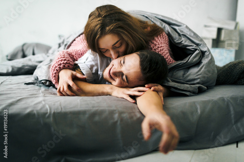 Wife Kissing Her Husband In The Bed Artwork Soft Focus