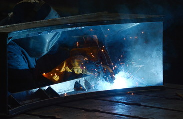 Working at the plant makes welding and cutting of metal