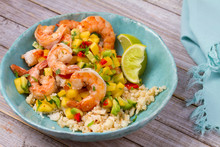 Shrimps With Mango Avocado And Red Pepper Salsa On Cauliflower Rice