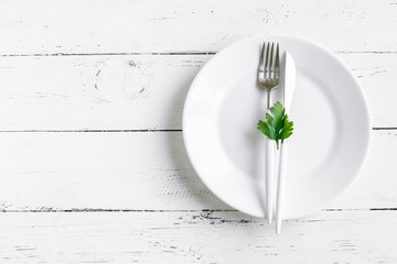 Wall Mural - Table setting with green leaf