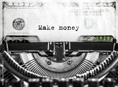 Make Money Text Printed On An Old Typewriter On A Background Of A - make money text printed on an old typewriter on a background of a dollar banknote texture