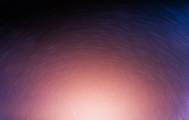 Wall Mural - landscape of long exposure stars trails with polaris and sunrise.