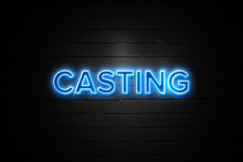 Casting Neon Sign On Brickwall