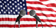 USA flag background with two microphones in front of it. Close up view. 3d illustration