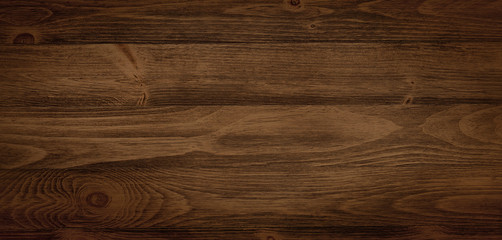 dark stained wood boards with grain and texture. flat wood background with parallel horizontal lines