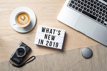 Wall Mural - What's new in 2019 written on lightbox as flatlay