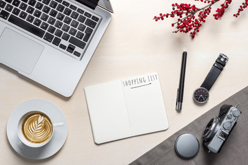 Wall Mural - Shopping list written on open notepad in office as flatlay