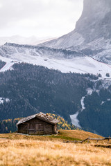 Wall Mural - Wooden cottage in dolomities alps Italy