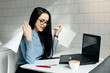 © mnelen.com - business young girl freelancer with glasses works a lot