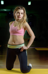 Wall Mural - girl with her hair in the gym.