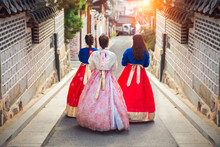 Korean Lady In Hanbok Walk In An Ancient Town
