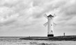 Black and white picture of the windmill lighthouse in Swinoujscie, Poland.