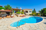 Fototapeta Desenie - Private swimming pool and patio area