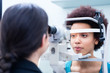© Kzenon - Optician measuring women eyes with refractometer in optician shop
