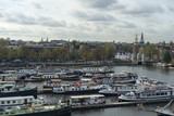 Fototapeta Londyn - Lots of boats in the Oosterdok in Amsterdam