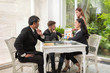 © Nattanon - Young professionals work in modern office.Project manager team discussing new idea