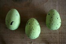 Easter Concept - Quail Green Eggs On Wooden Table; Top View, Selective Focus.