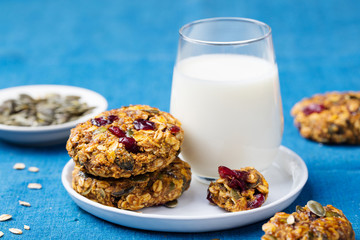 Wall Mural - Pumpkin, oat cookies with cranberries, glass milk