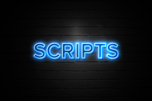 Scripts Neon Sign On Brickwall