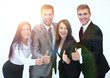 © ASDF - happy business team showing thumb up.i