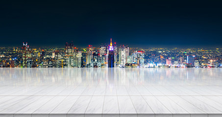 Wall Mural - Business concept - Empty marble floor top with panoramic modern cityscape building bird eye aerial view under sunrise and morning bright sky of Tokyo, Japan, for display or montage product.