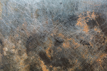 Grunge metal background with scratches and rust