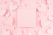 Blank Pink Square Page With Paper Hearts On Light Background. Advertesign Concept For Valentine Day.