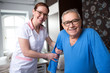© didesign - Smiling happy senior patient and nurse