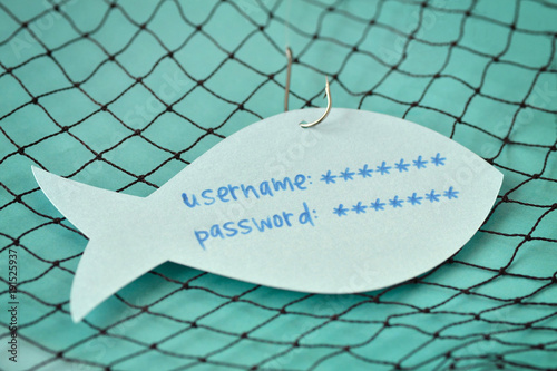 Fotografía Username and password written on a paper note in the shape of a fish attached to