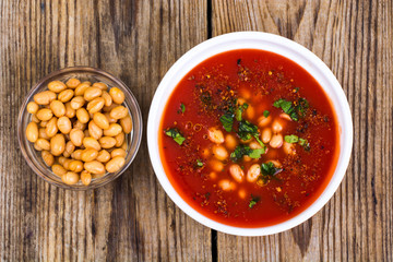 Poster - Canned white beans in tomato sauce. Spicy food