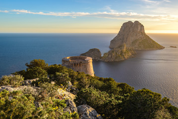 Wall Mural - Savinar Tower and Es Vedra island at sunset, Ibiza, Spain