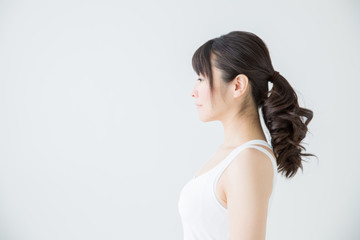 Fototapete - 目を瞑る女性の横顔
