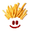 Hair from potatoes. French fries  and a face with a smile from ketchup isolated on white background