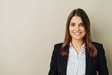 Stylish young businesswoman with a confident smile