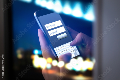 Cuadros en Lienzo Login with smartphone to online bank account or personal information on internet at night