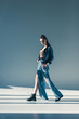 © LIGHTFIELD STUDIOS - beautiful young woman posing in stylish denim clothes