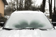 Defrosting ice from car windshield
