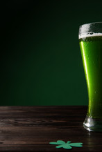 Glass Of Green Beer With Shamrock On Table, St Patricks Day Concept