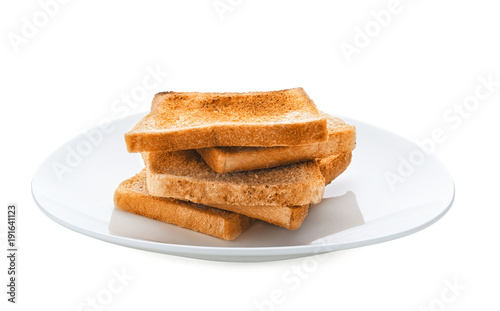 Fotografía Plate with toasted bread on white background