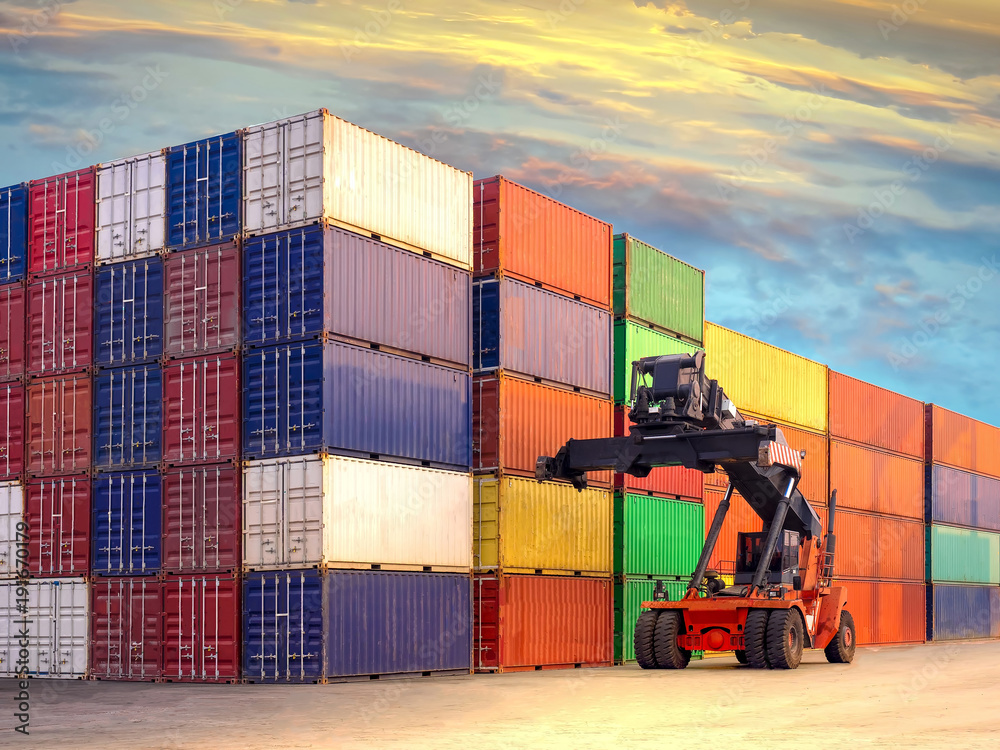 Reachstacker is moving full loaded containers at industrial port and ...