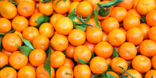 Perfect Background Of Ripe Clementines For Sale At The Market