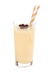 Wall Mural - coffee, banana smoothie in a tall glass with straws. side view, isolated on white.
