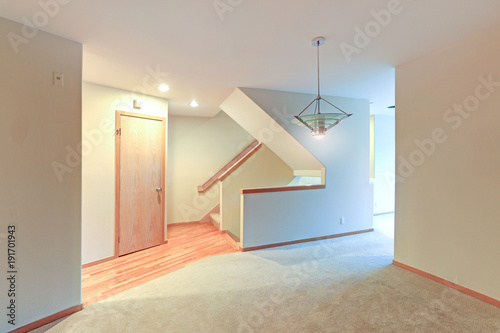 Empty Apartment Interior Features White Walls And Beige Carpet Floor Empty Apartment Interior Features White Walls And Beige Carpet Floor