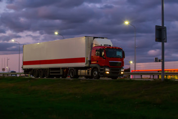 Wall Mural - truck moves on highway at night