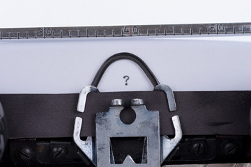 Fototapete - Concept image with question mark written on an old retro typewriter