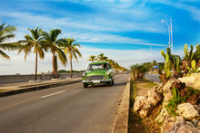 Old Green American Car On The Cienfuegos Malecon