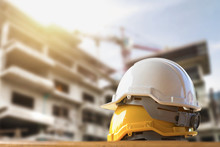 Yellow And White Helmet Safety In Construction Site