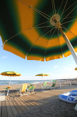 Wall Mural - umbrella on the beach photographed from below in the summer during the holidays